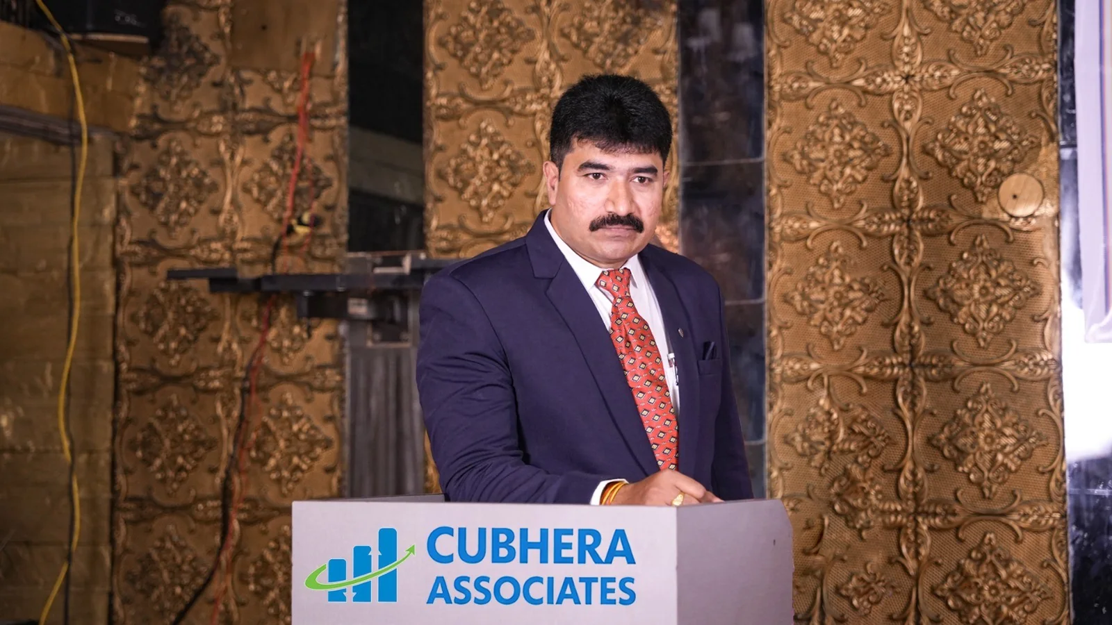 Datteswara Rao Sheikh, Founder and Chairman of Cubhera Associates, speaking at a Cubhera Associates event